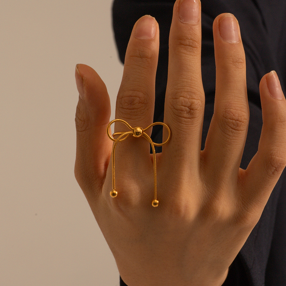 Title 3, Retro Bow Titanium Steel Ring, a stylish and du...