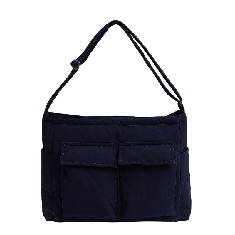 Bolsa de lona de explosión de comercio exterior para mujeres 2025 nuevo viaje multibolsillo bolso de gran capacidad para trabajar mochila de hombro