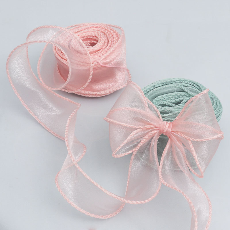 Fábrica en stock Venta caliente 4cm hilado curvado con flores material de embalaje de regalo con cinta de flores elegante hilo de cola de pescado