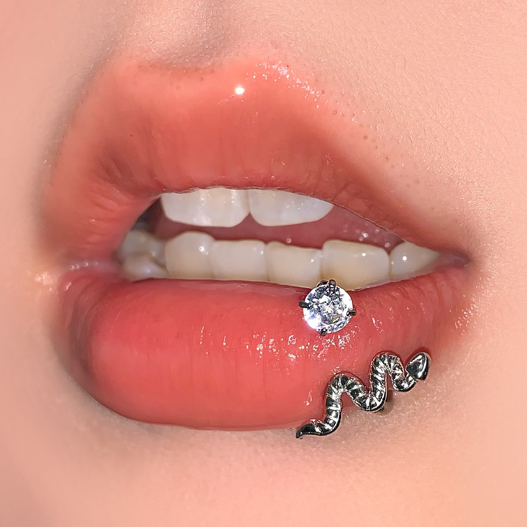 Silver pointed spike labret stud material detail