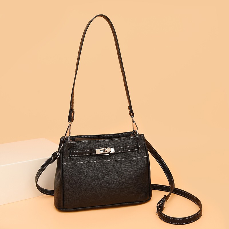 Otoño y invierno de 2024, nueva bolsa de hombro de mujer universal, bolsa de estilo simple, bolsa de transporte de viaje portátil, bolsa de sensación de alto nivel