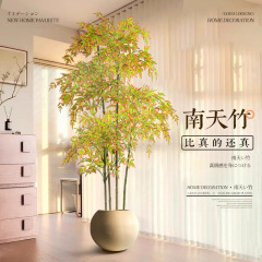 緑植南天竹のハイエンドの軽豪華なバイオニック義肢のリビングルームの床にある盆栽の置物の室内の偽緑植の装飾をシミュレーションします。