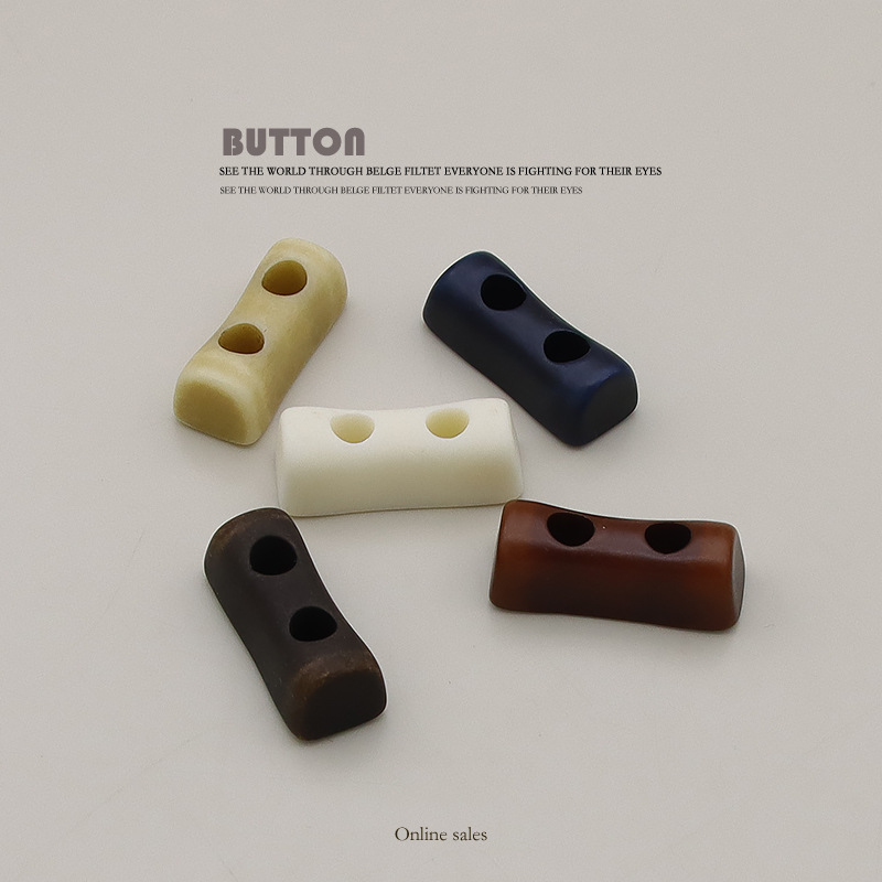 纽扣长方形两眼风衣女树脂黑色钮扣子高端男西装衣服大衣配件批发