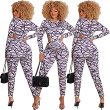 BX6059欧美跨境女装 亚马逊 速卖通 秋冬季女装 不规则印花两件套