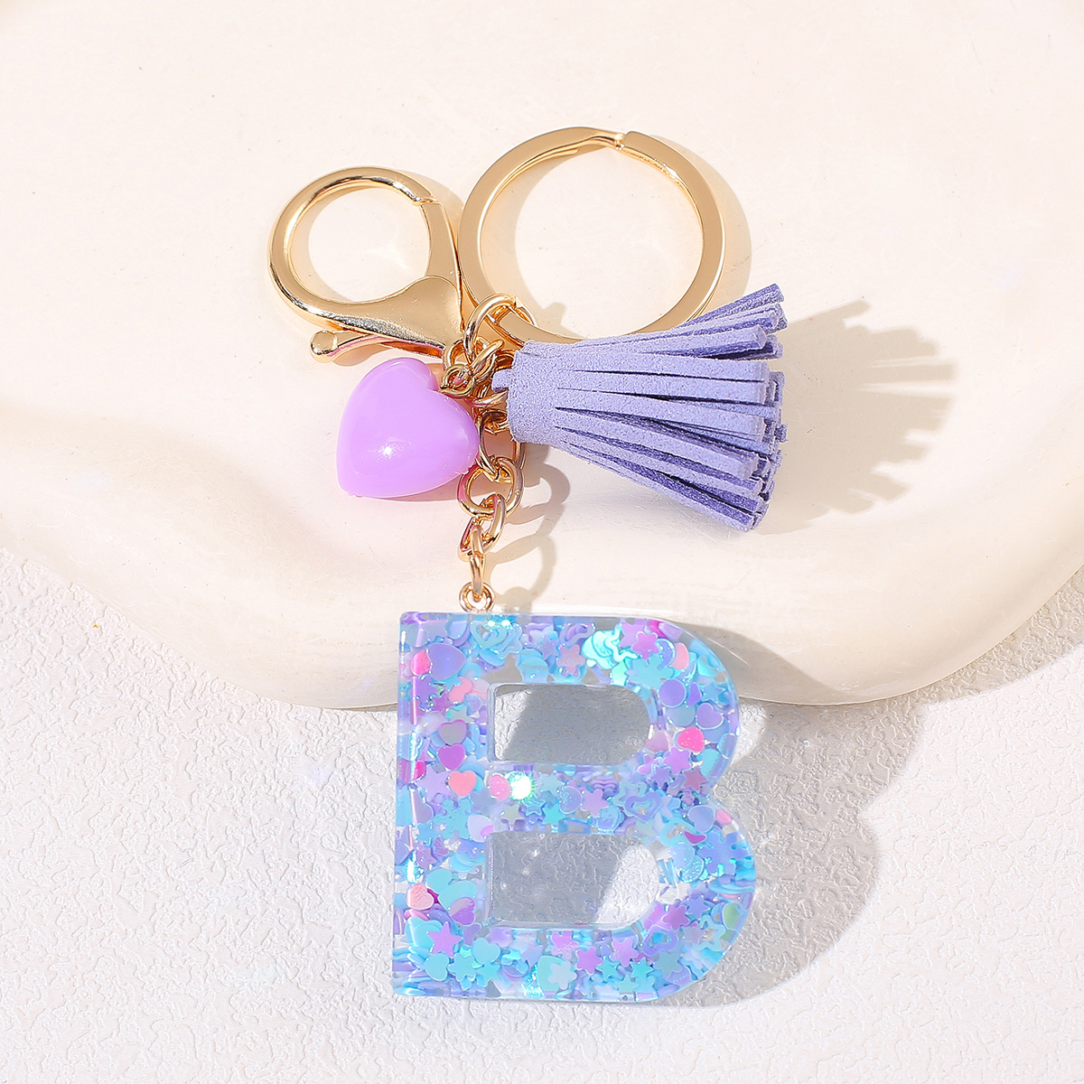 Nuevo estilo de mujer amor púrpura bordilla 26 letras llavero encantador llavero de automóvil pareja joyas mochila