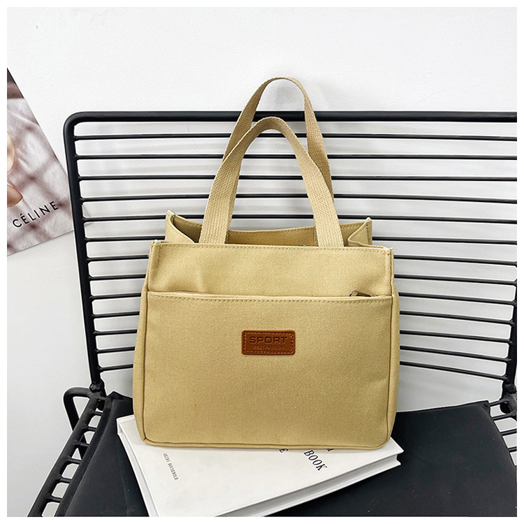 New wholesale fashionable and high-quality canvas handbag, simple and portable, easy to carry for going out, versatile lunch box and bento bag undefined