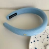 Blue solid gold label hoop