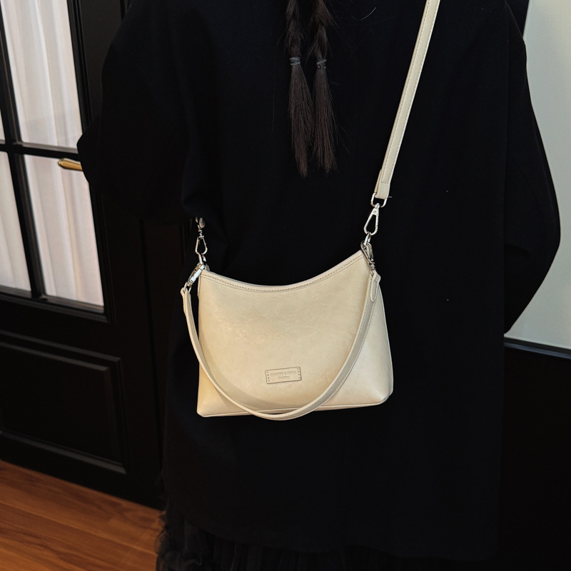 Bolsa de brazo popular diaria coreana de nicho para mujeres 2026 nueva moda mochila de hombro para viajar bolso cuadrado simple