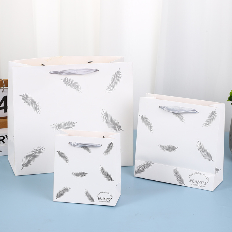 New Gift Bag Christmas Gift Bag Paper Bag Feather Back Gift Bag Ribbon Clothing Bag New Year Gift Bag New Gift Bag Christmas Gift Bag Paper Bag Feather Back Gift Bag Ribbon Clothing Bag New Year Gift Bag