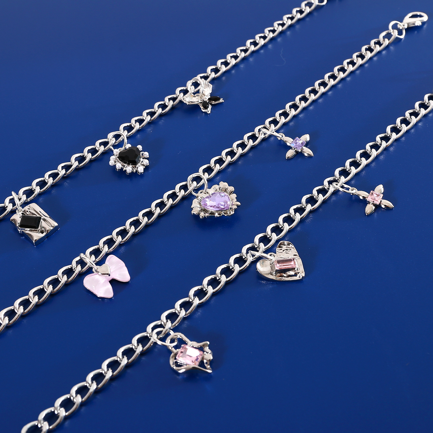Comercio exterior mascotas collar de metal gemas amor arco colgante de zircon viento dulce gato perro collar de plata