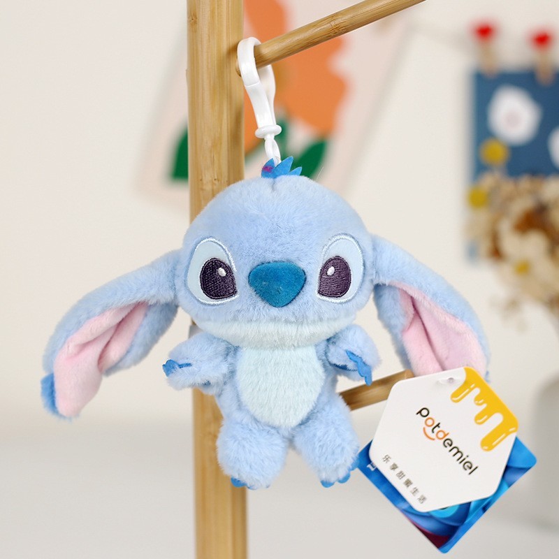 Genuine Disney autorizó la nueva muñeca de peluche Strawberry Bear Pooh Stitch juguete colgante de tres ojos