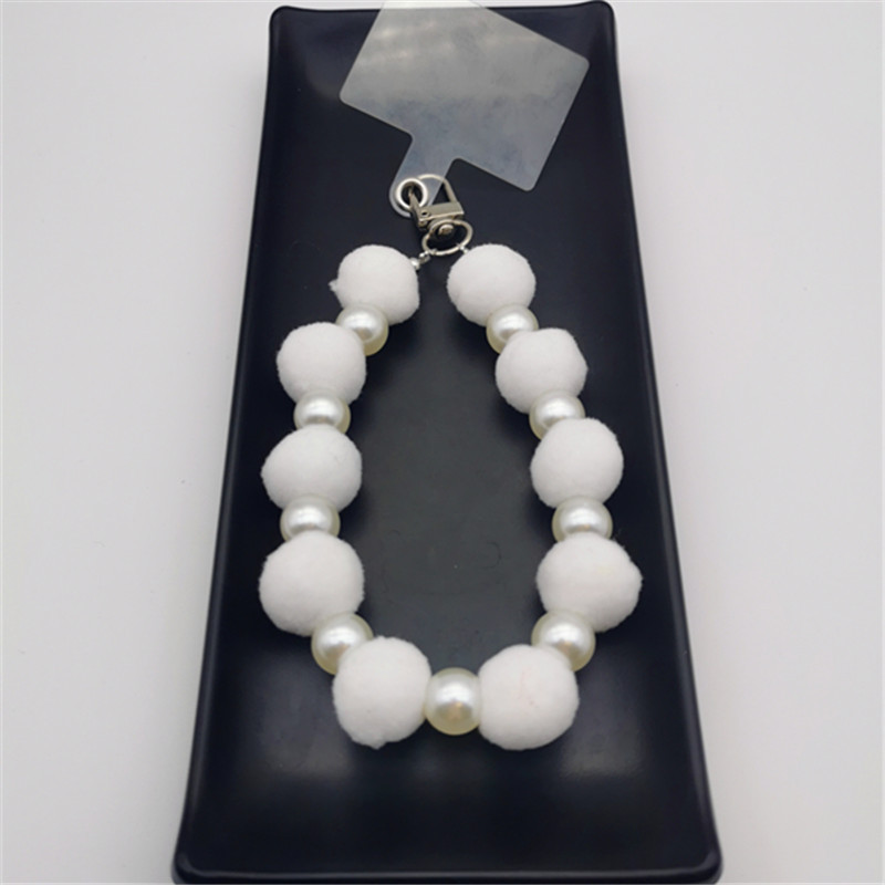 Nueva bola de piel de cadena de perlas colgante cadena de teléfono móvil ins Internet celebridad mismo estilo muñeca de invierno pulsera peluda cadena portátil
