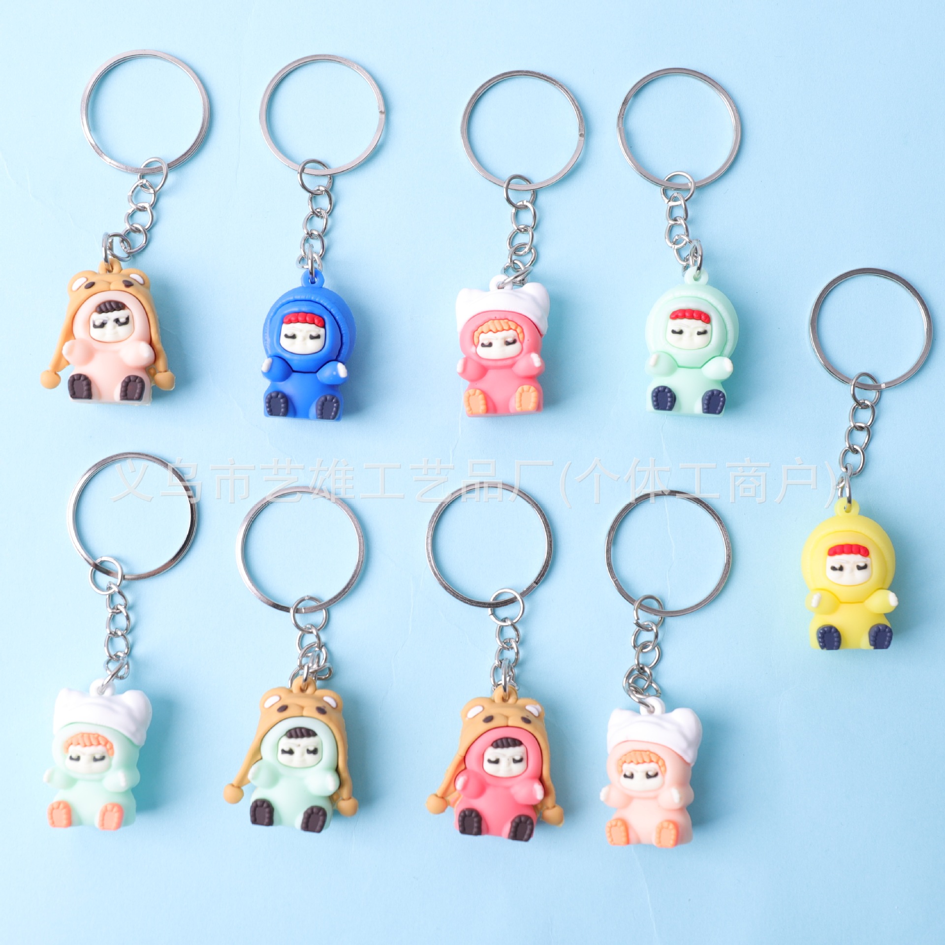 Nuevo estilo de dibujos animados de PVC huevo llavero de fiesta muñeca pequeña decoración creativa pegamento suave adorable colgante al por mayor