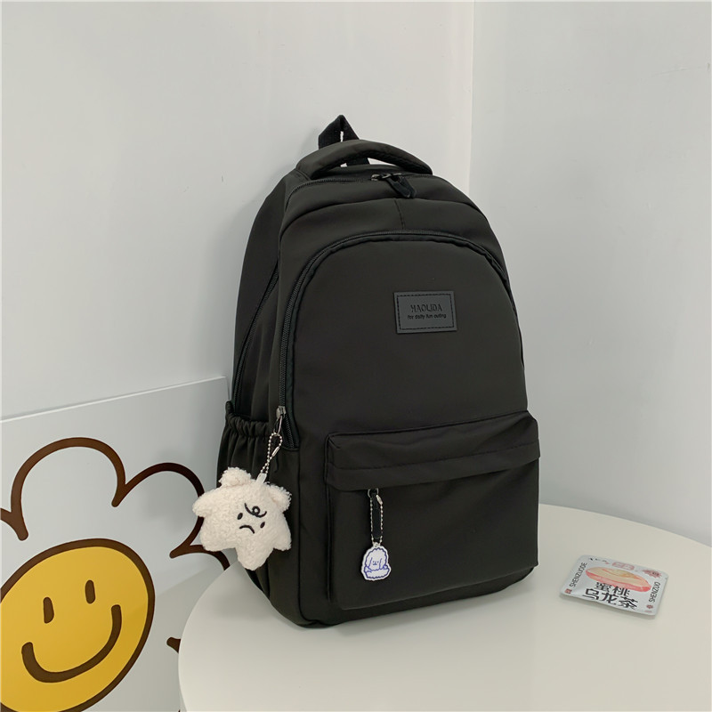 Mochila de las mujeres nuevo nylon color sólido estudiante de la escuela secundaria mochila de gran capacidad simple todo-fósforo estudiante universitario mochila impermeable