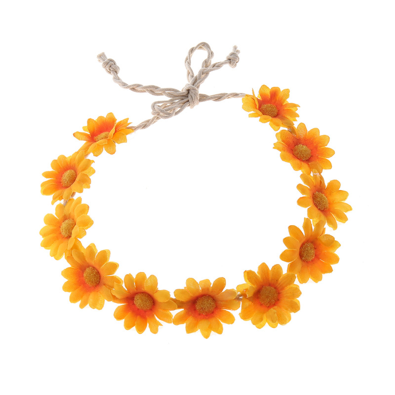 女性の女の子のヘアバンドは11輪の花の頭を編んで小さい太陽の花を持って旅行します。|undefined