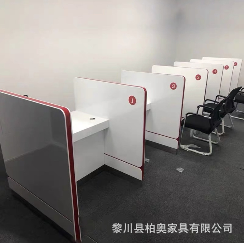 国家電力網業務誘導取扱銀行非現金カウンター相談台営業所受付台が事務机に記入する|undefined