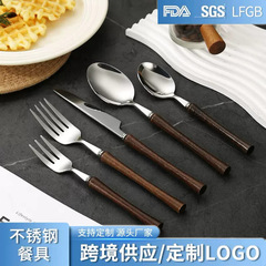 創意304ステンレスの実木の柄の小さい腰の洋食の刀のフォークのスプーンのセットの中国式の手羽の木のパスタの刀のフォークのスプーン