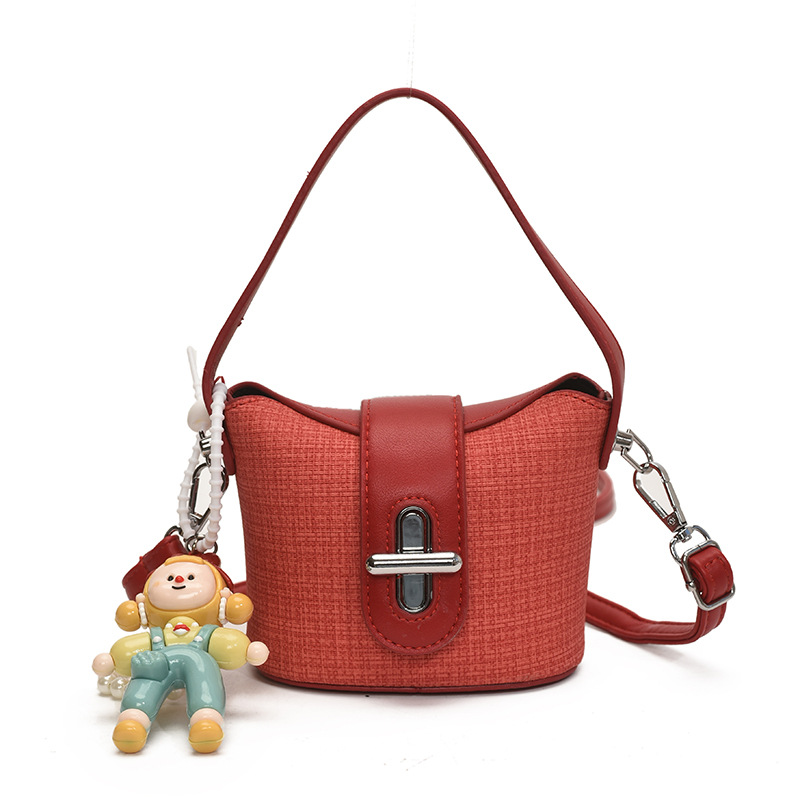 Bolso de hombro para niña de moda, muñeca linda, bolso de bebé colgante, nuevo mini bolso para niños 2025