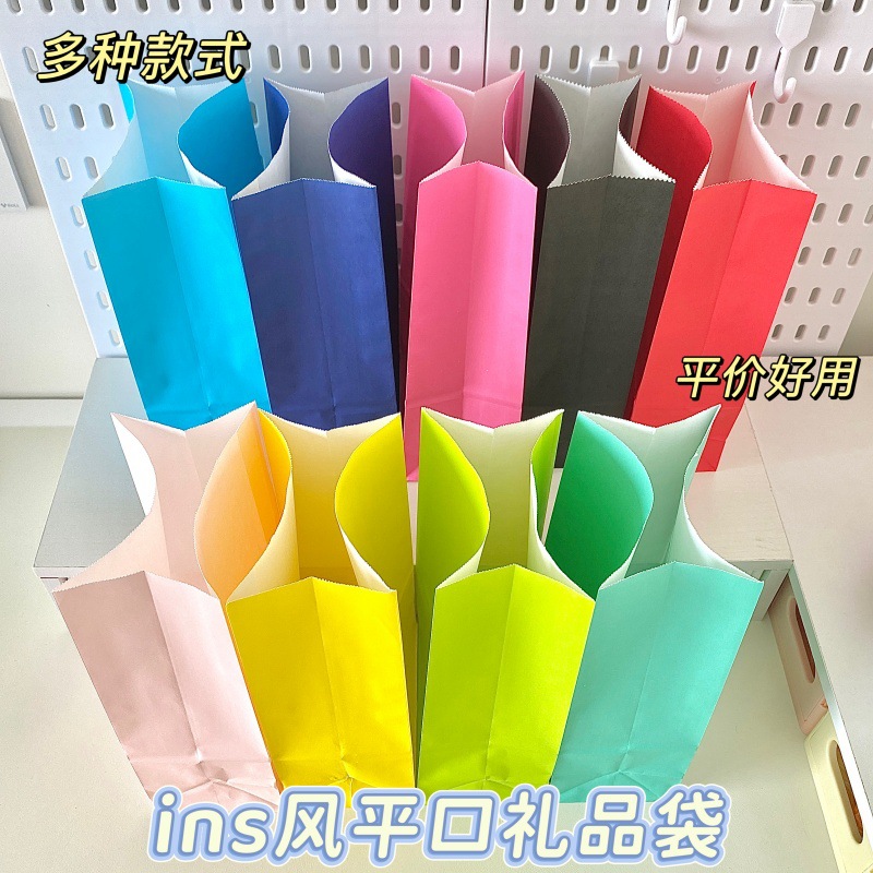 Bolsas de papel kraft coloridas bolsas de regalo bolsas de embalaje para llevar bolsas de regalo bolsas de bolsillo plano en el viento lindo paquete pequeño