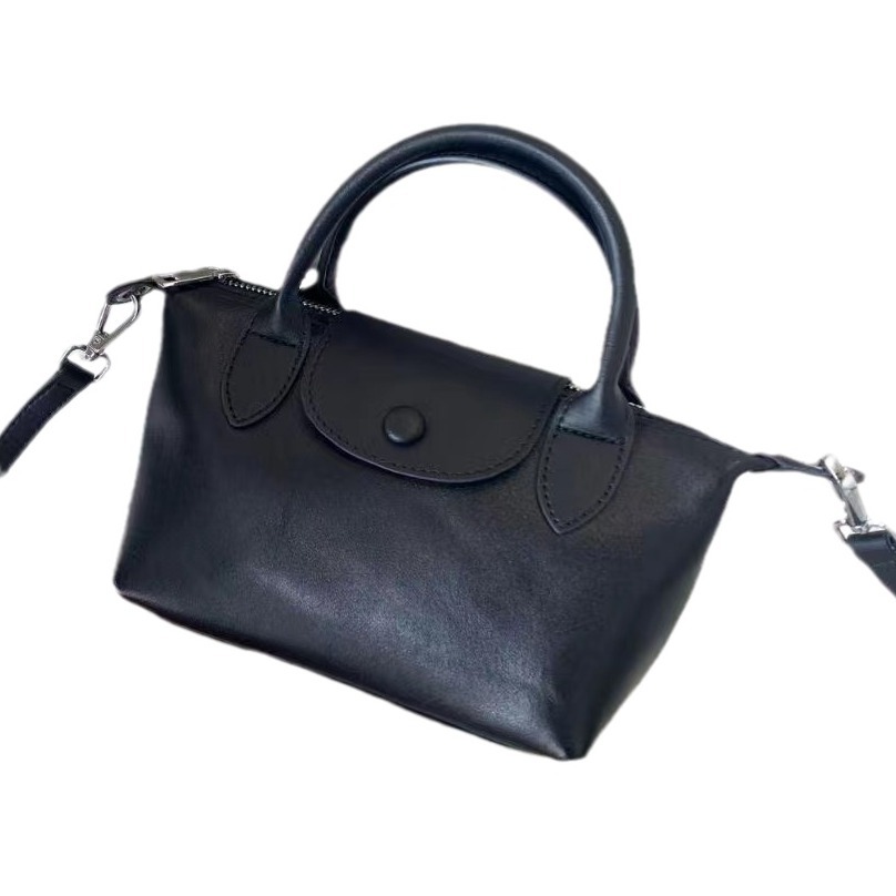 Bolsos femeninos 2024 nuevos bolsos femeninos de cuero de alta costura de moda 100 bolsos correccionales para viajeros de nicho bolsos portátiles