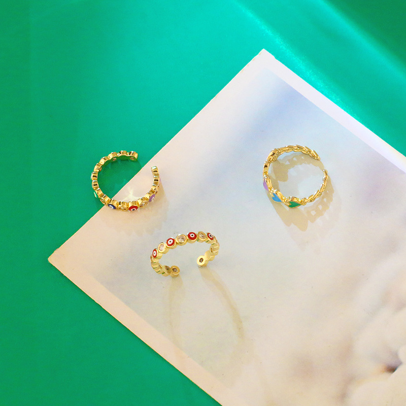 European and American open copper ring micro-inlaid zircon color drip oil creative eye ring