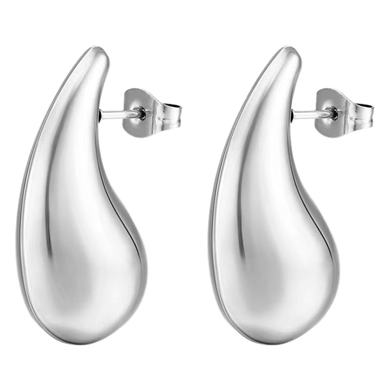 Aretes huecos de acero inoxidable de moda transfronteriza lujoso ligero temperamento femenino simple aretes de acero de titanio simple personalidad auriculares