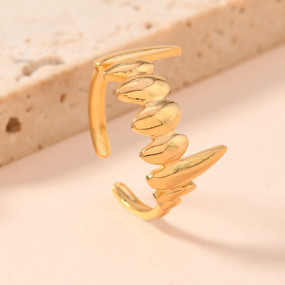 Diseño de moda transfronterizo sentido de joyería de estilo punk personalidad acero inoxidable presión de aceite colmillos dientes titanio anillo abierto de acero