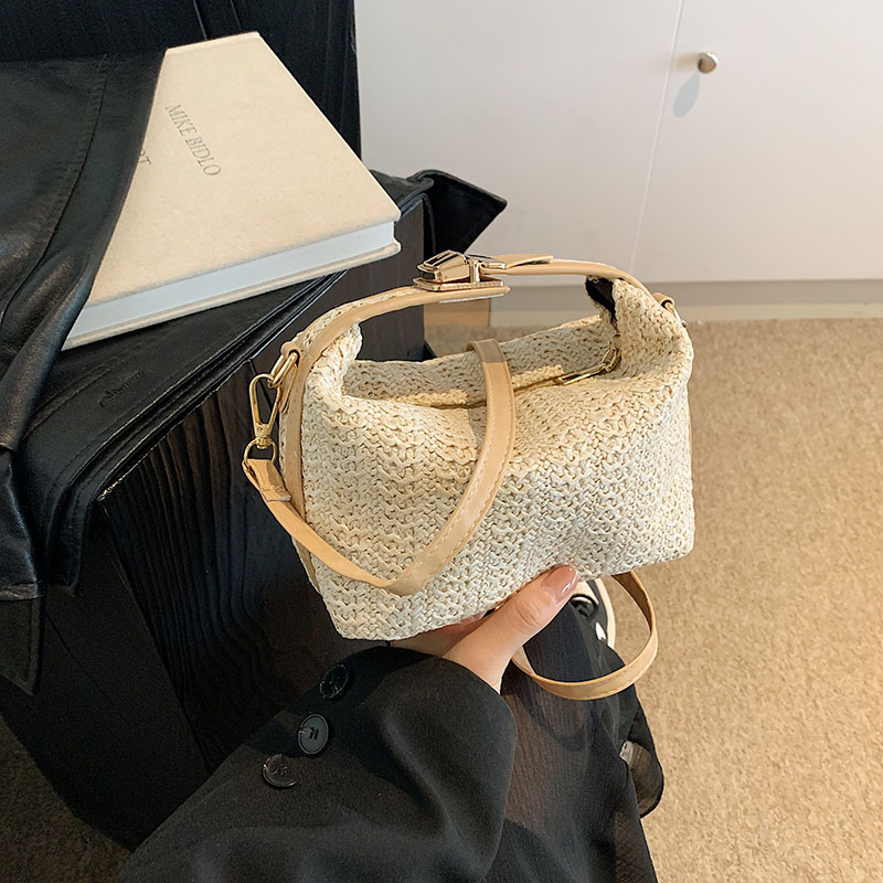 Bolsa de vacaciones de paja de estilo de verano para mujeres, nuevo nicho de diseño de hombro, bolso de mano, bolso de vacaciones de playa