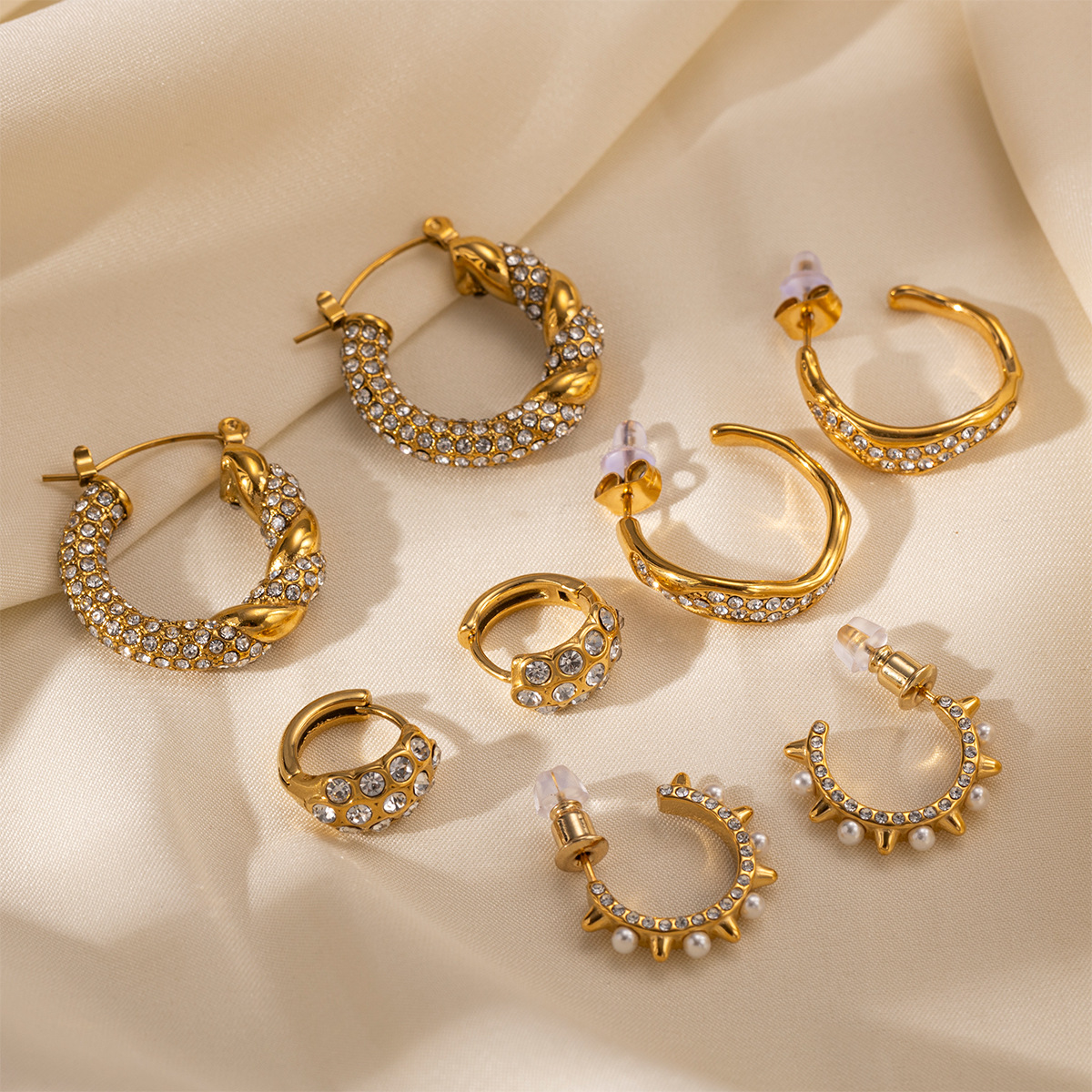 TENA Europa y los Estados Unidos transfronterizos galvanizados de acero inoxidable 18k aretes de oro ligero lujoso de alto nivel parecen cientos de aretes de diamantes para mujeres