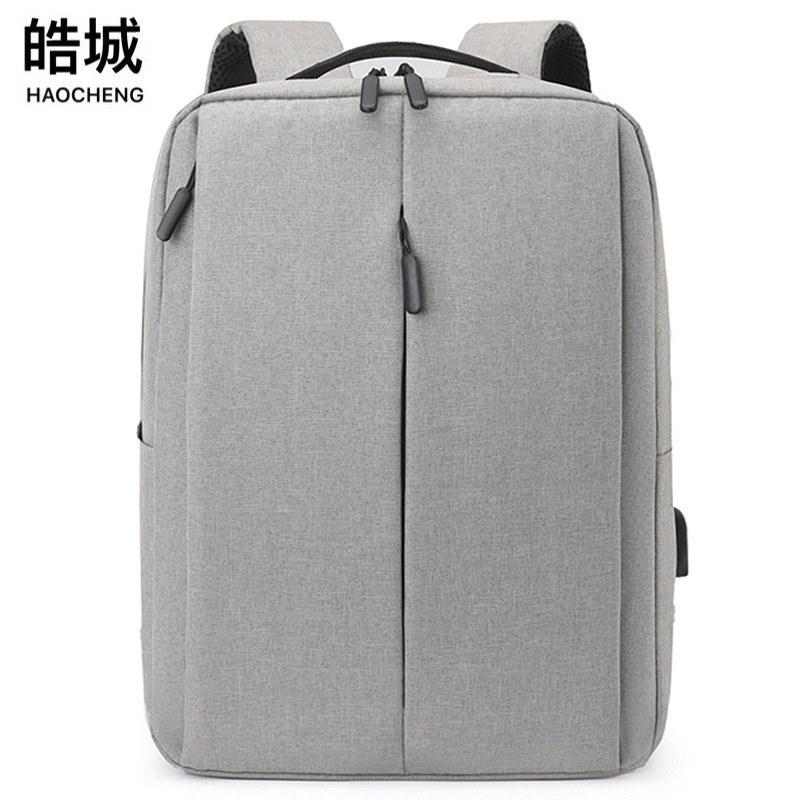 Bolso de computadora de negocios para hombre simple casual nuevo estilo transfronterizo, mochila para estudiantes de viaje al aire libre de gran capacidad