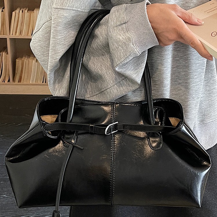 Bolsos de tendencia diaria coreana 2026 primavera nueva moda simple gran capacidad bolso de hombro bolso especial
