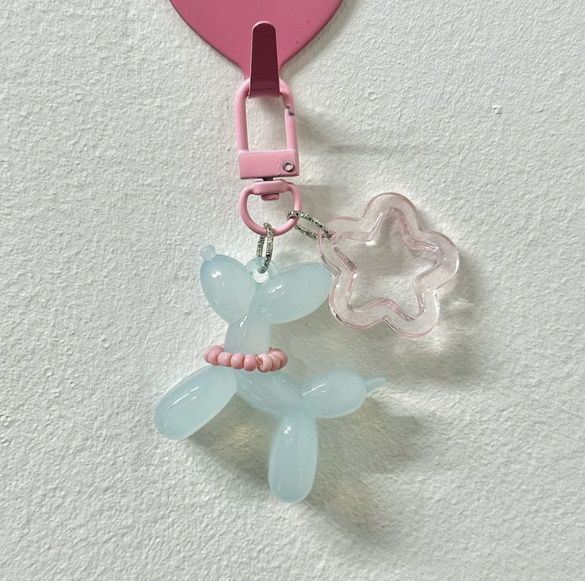 Pequeño Libro Rojo mismo lindo jalea globo láser perro llavero colgante colorido cachorro de dibujos animados teléfono llavero