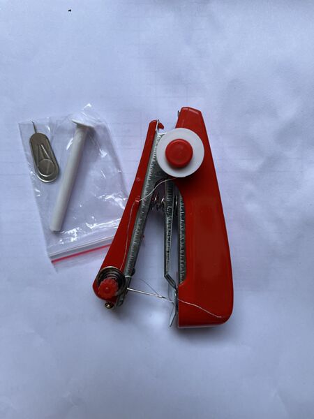 Manual sewing machine. Mini sewing machine. Small sewing machine