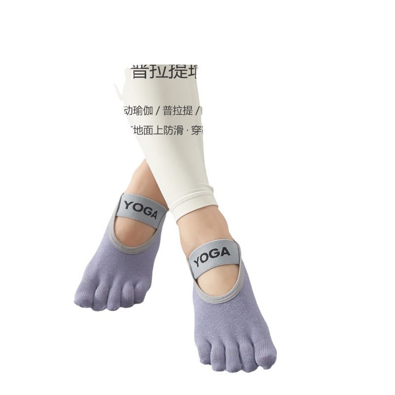Primavera y verano calcetines de yoga antideslizantes de algodón de color sólido de las mujeres calcetines de cinco dedos sin respaldo absorbente del sudor ins de moda todo el partido trampolín con cordones calcetines del dedo del pie