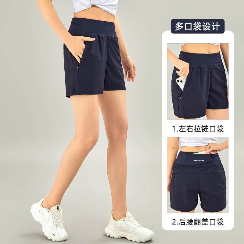 Pantalones cortos deportivos de mujer hielo rápido secado bolsillo de cintura trasero puede poner el teléfono móvil yoga pantalones casuales sueltos corredores cortos comercio exterior