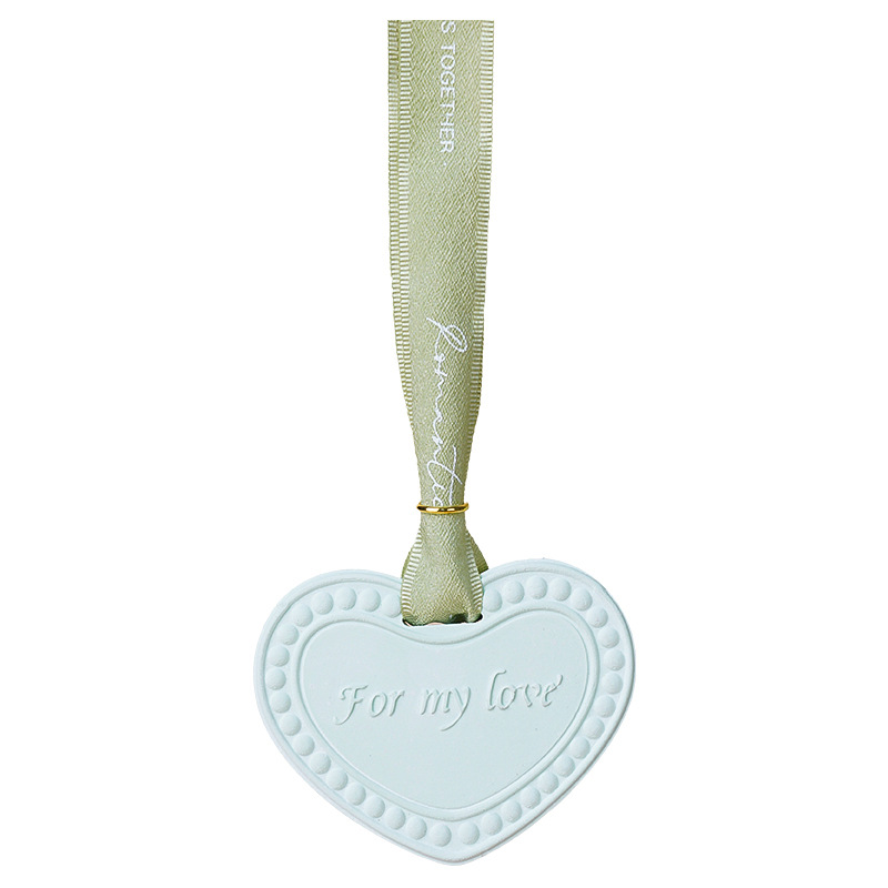 Armario perfumado colgante de banda magnética Qixia regalo creativo regalo de acompañante transfronterizo sólido piedra de fragancia amor adornos de automóviles