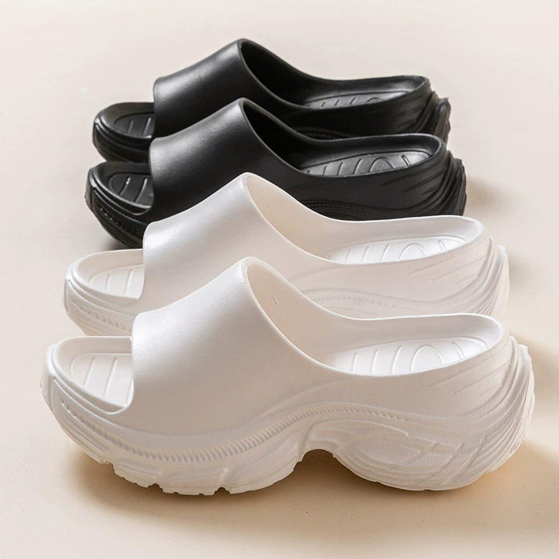 Трансграничные 7,0 толстое дно, чтобы наступить на дерьмо EVA, холодные тапочки женщины увеличены летом