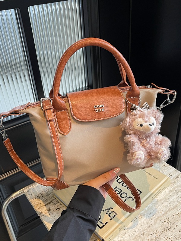 Nylon color contrastante empalme bolso de bolsillo portátil mujer 2024 nuevo estilo transfronterizo de alta calidad exquisita mochila de hombro