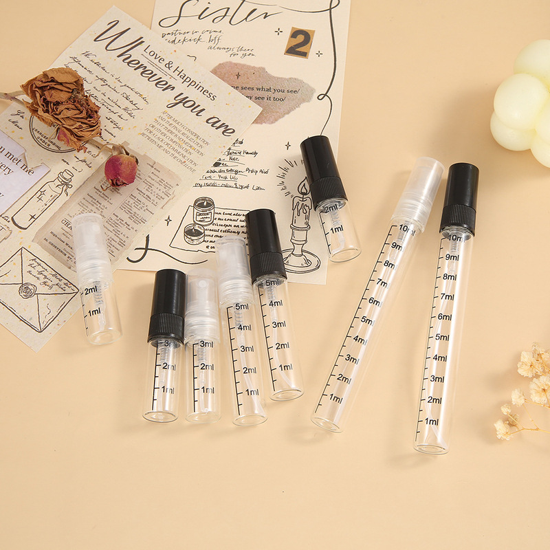 Transparent graduated spray glass bottles, available in various sizes, mini and portable, perfect for perfume samples, cosmetic sprays, and empty bottles – in stock now