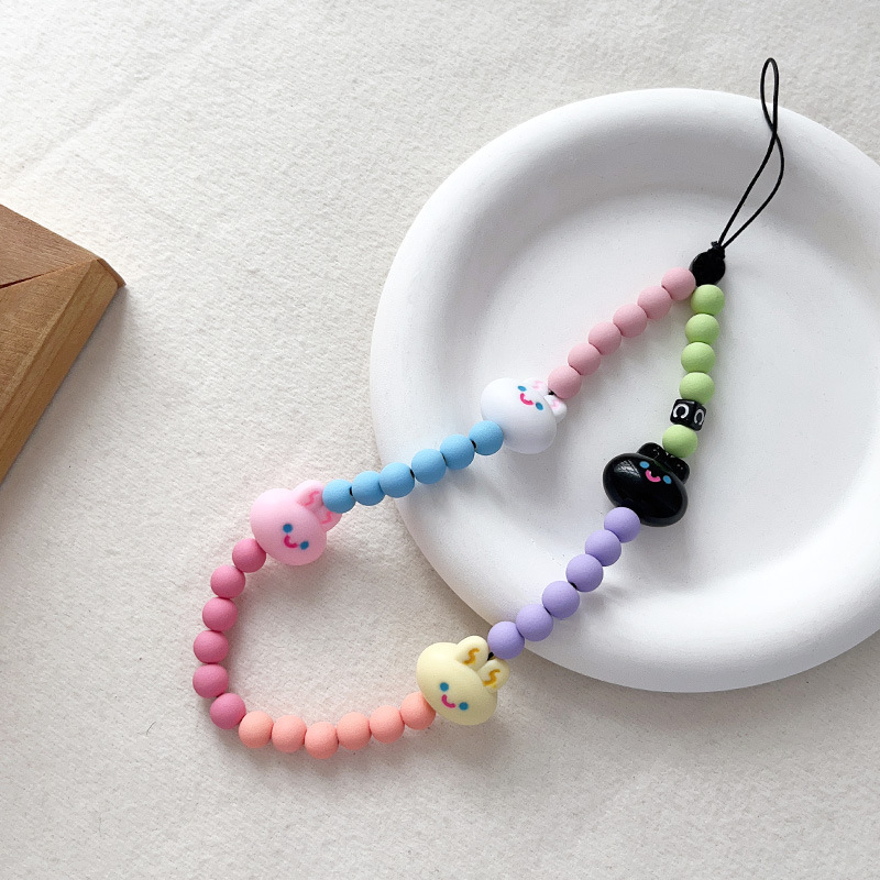 Tian Xiwei con una linda chica crema de dulces conejos acrílico de color multipropósito a prueba de pérdida de la cadena de colgante de teléfono móvil