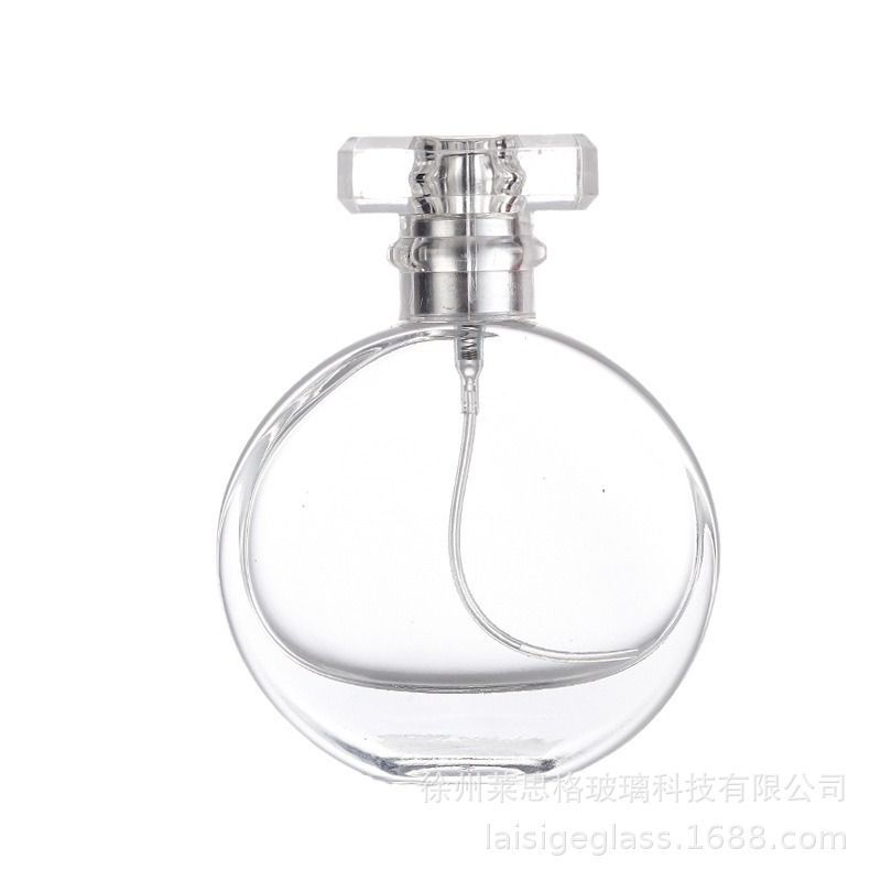 Botella de perfume de vidrio transparente al por mayor de 30ml 50ml con cabezal de bomba, botella vacía con empaque exquisito
