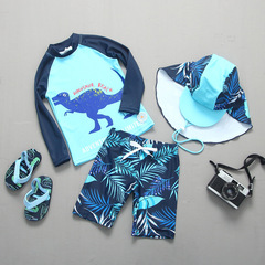 Korean-made kids' swimwear for boys: Dinosaur-themed long-sleeve, two-piece design with sun protection and quick-drying features&mdash;perfect for seaside vacations and swimming fun for older children.