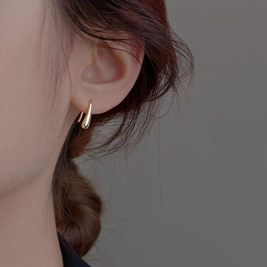 Nuevos pendientes de gota de agua brillantes y modernos, diseño exclusivo, ganchos para las orejas frescos y dulces, pendientes de diseño sencillo estilo forestal.