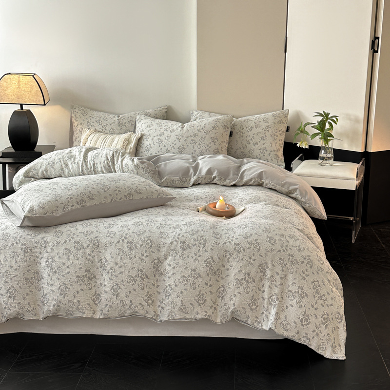 Una clase de madres y bebés de algodón molido cuatro piezas Nantong ropa de cama textil de algodón sábanas de cama cuatro piezas