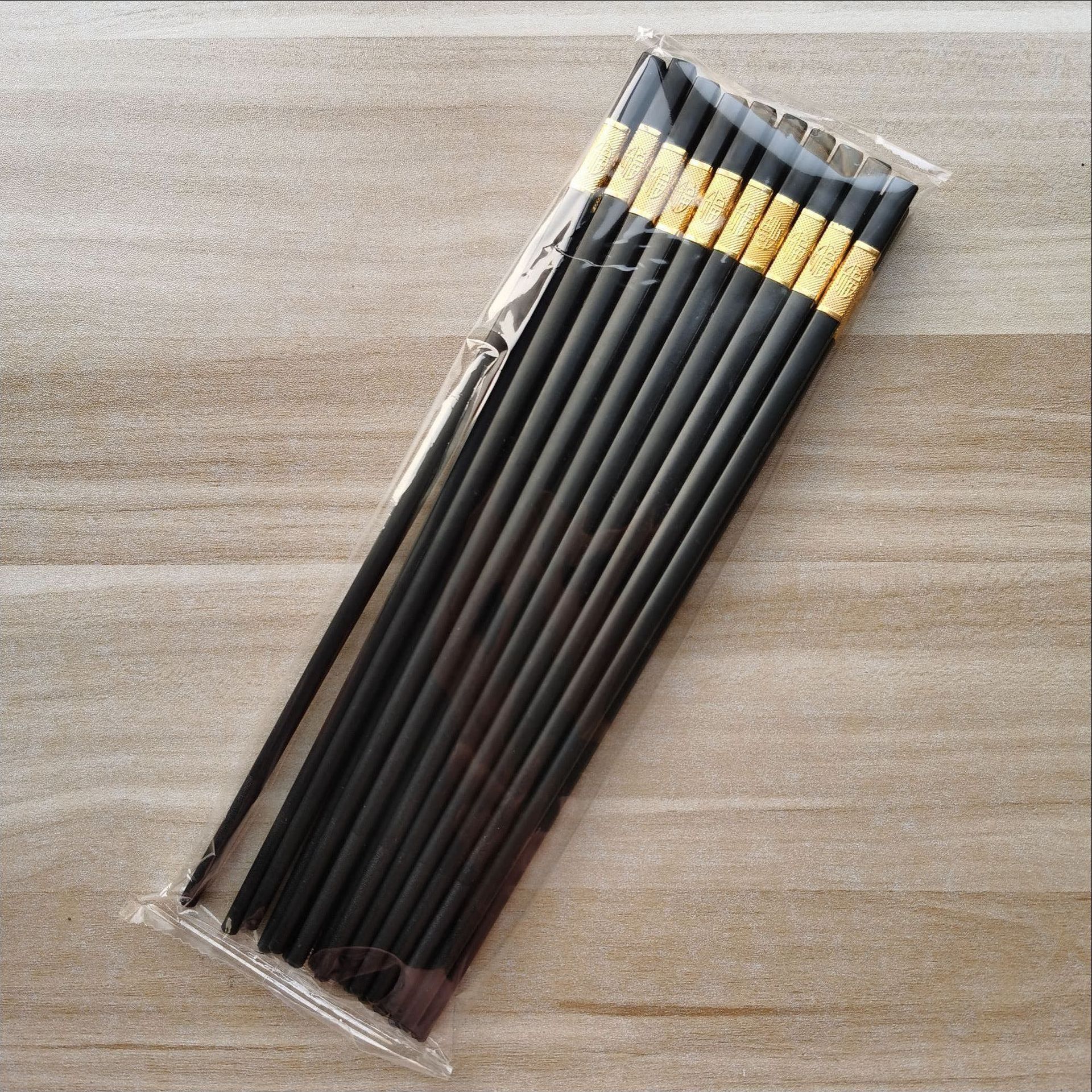 Palillos del hogar de alto grado de aleación de plástico anti-moho de alta temperatura resistente de doble capa no-moho palillos de lujo de alta gama de luz al por mayor