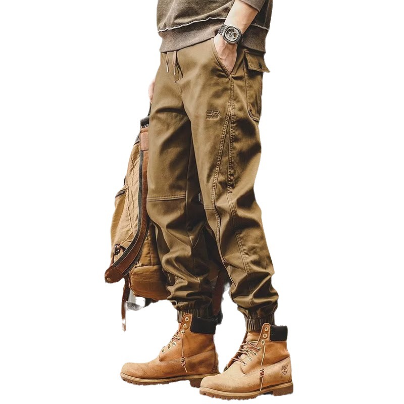 Pantalones casuales para hombres Primavera y otoño Nueva marca de moda coreana suelta más pantalones atados al tobillo pantalones al aire libre con volantes pantalones harén guapos en stock al por mayor