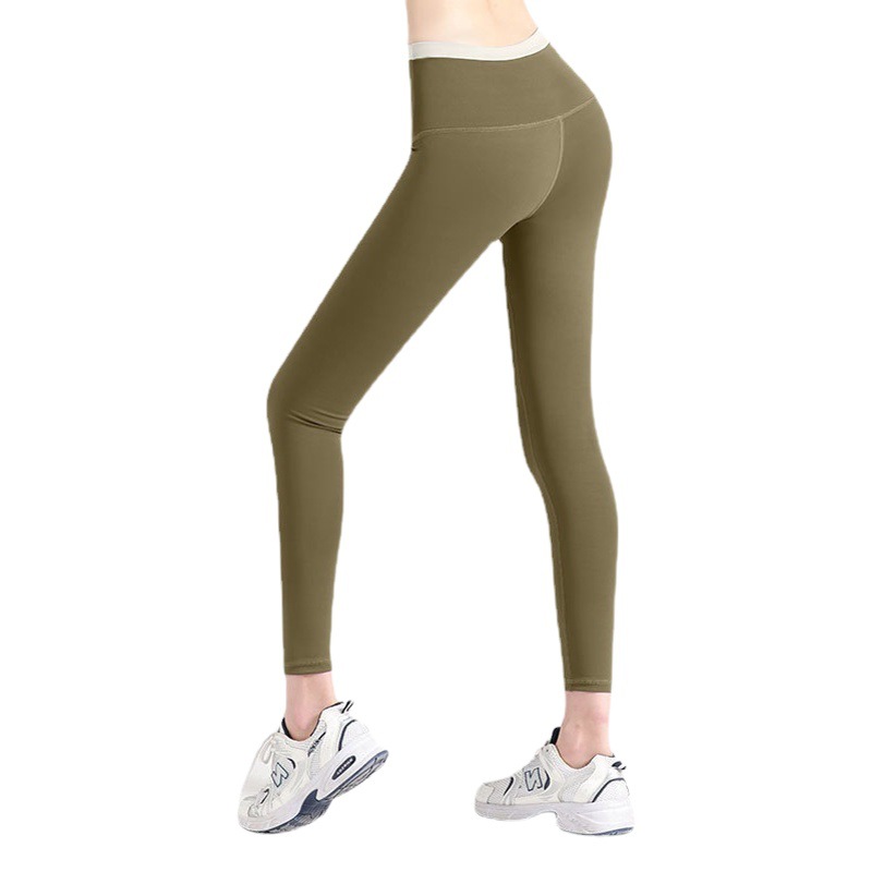 Juyi Tang no vergüenza línea yoga pantalones sin costura cintura costura transpirable deportes running fitness recortada pantalones para mujeres