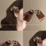 女性早春气质蕾丝刘海夹