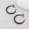 Red mosquito coil, ear clips