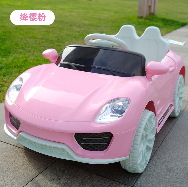 Nuevo lindo dibujos animados para niños coche eléctrico de cuatro ruedas de control remoto asiento de coche de carga doble coche asiento de juguete